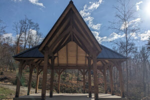 timber frame pavilion in forest